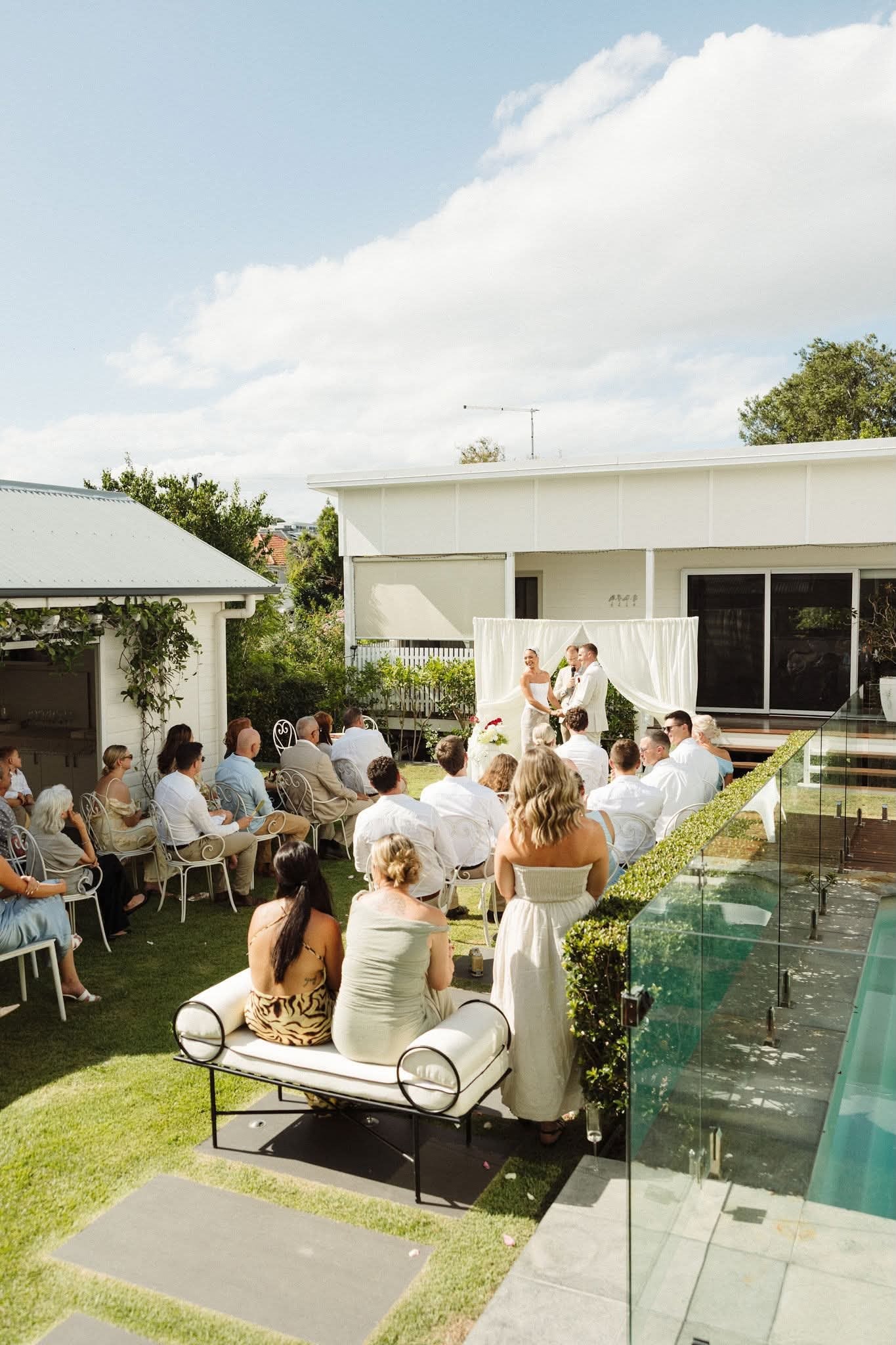 Backyard ceremony with Rumi Hires seating