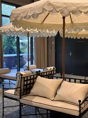 Lounge under wave umbrellas